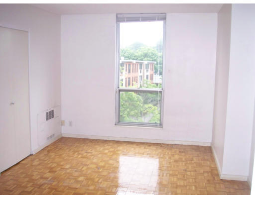 44 Washington Street, Unit 418 Brookline, MA 02445 - Photo 4 of 9 a view of an empty room and window