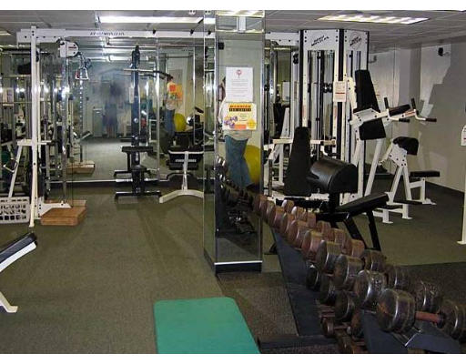 44 Washington Street, Unit 418 Brookline, MA 02445 - Photo 7 of 9 a view of a room with gym equipment