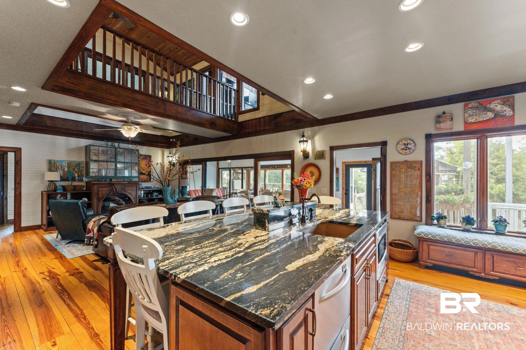 16451 Honey Road Summerdale, AL 36580 - Photo 6 of 55 Kitchen featuring a breakfast bar, brown cabinets, recessed lighting, and light wood-type flooring