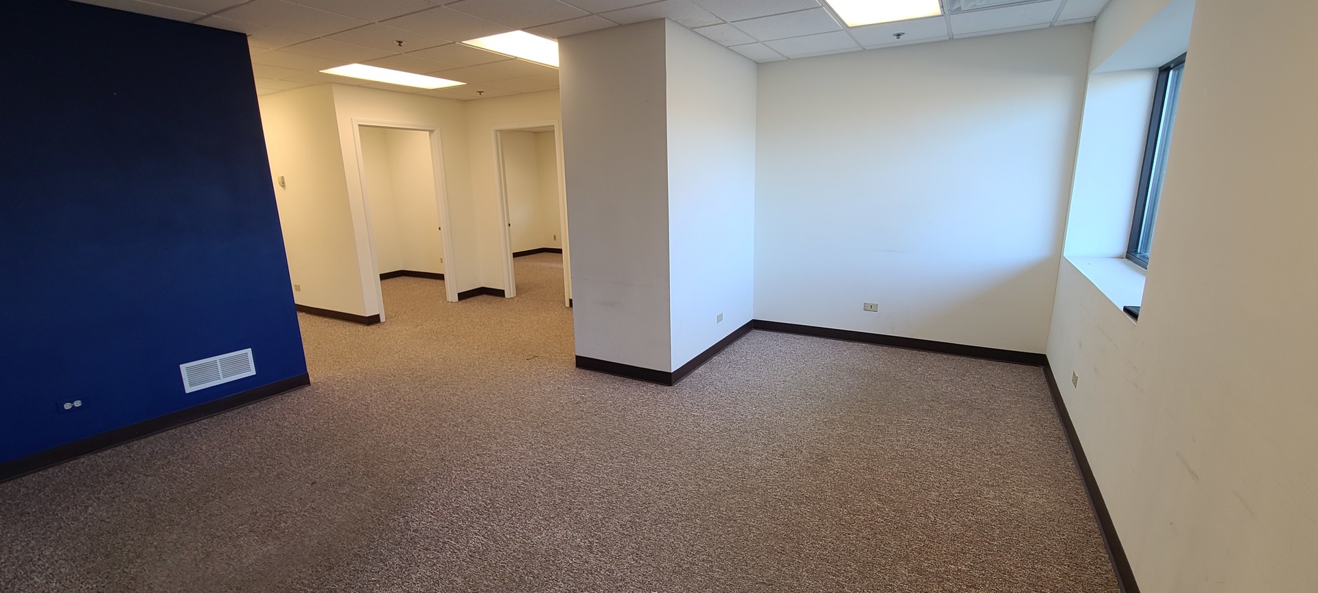 8527 West 191st Street, Unit 33A Mokena, IL 60448 - Photo 3 of 10 an empty room with windows