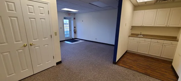 a view of a livingroom with a furniture and window