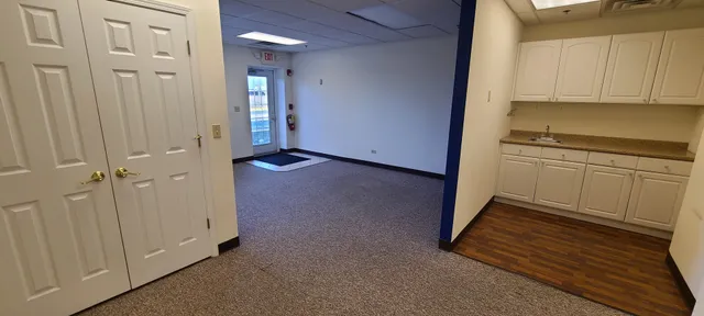 a view of a livingroom with a furniture and window