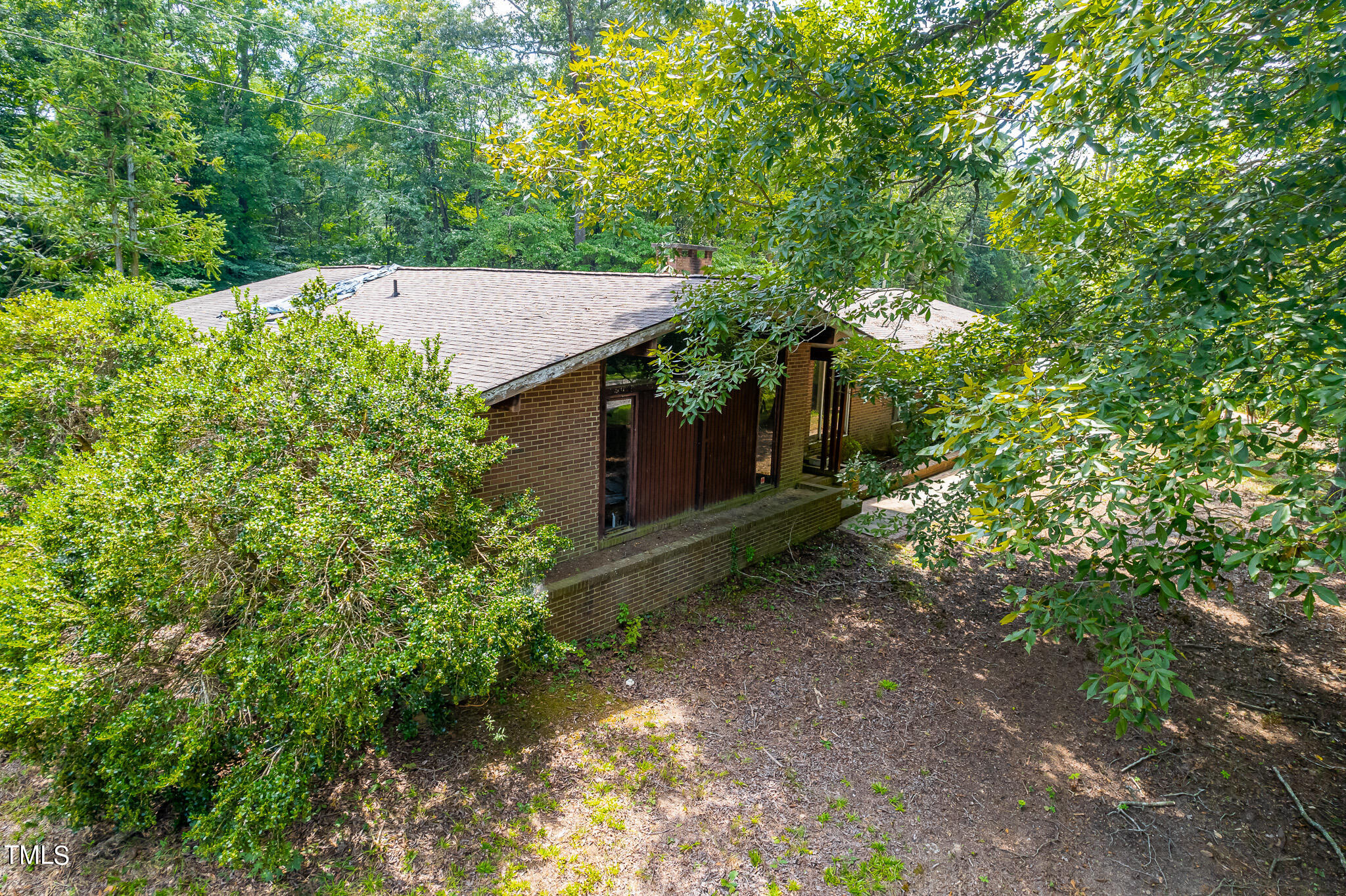 1875 Wilson Road Bennett, NC 27208 - Photo 15 of 70 Front Left Aerial View of Home