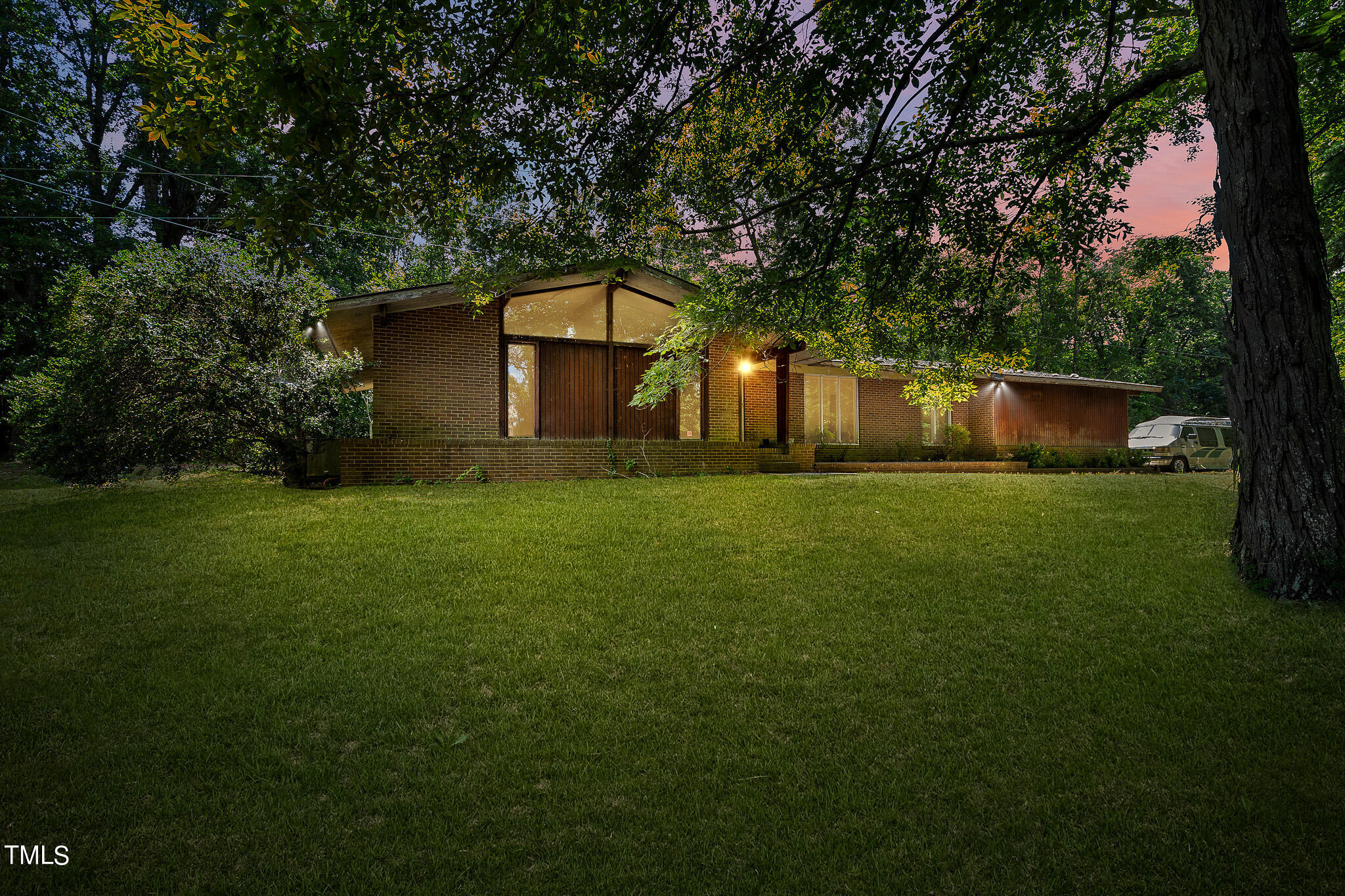 1875 Wilson Road Bennett, NC 27208 - Photo 2 of 70 a house view with garden space