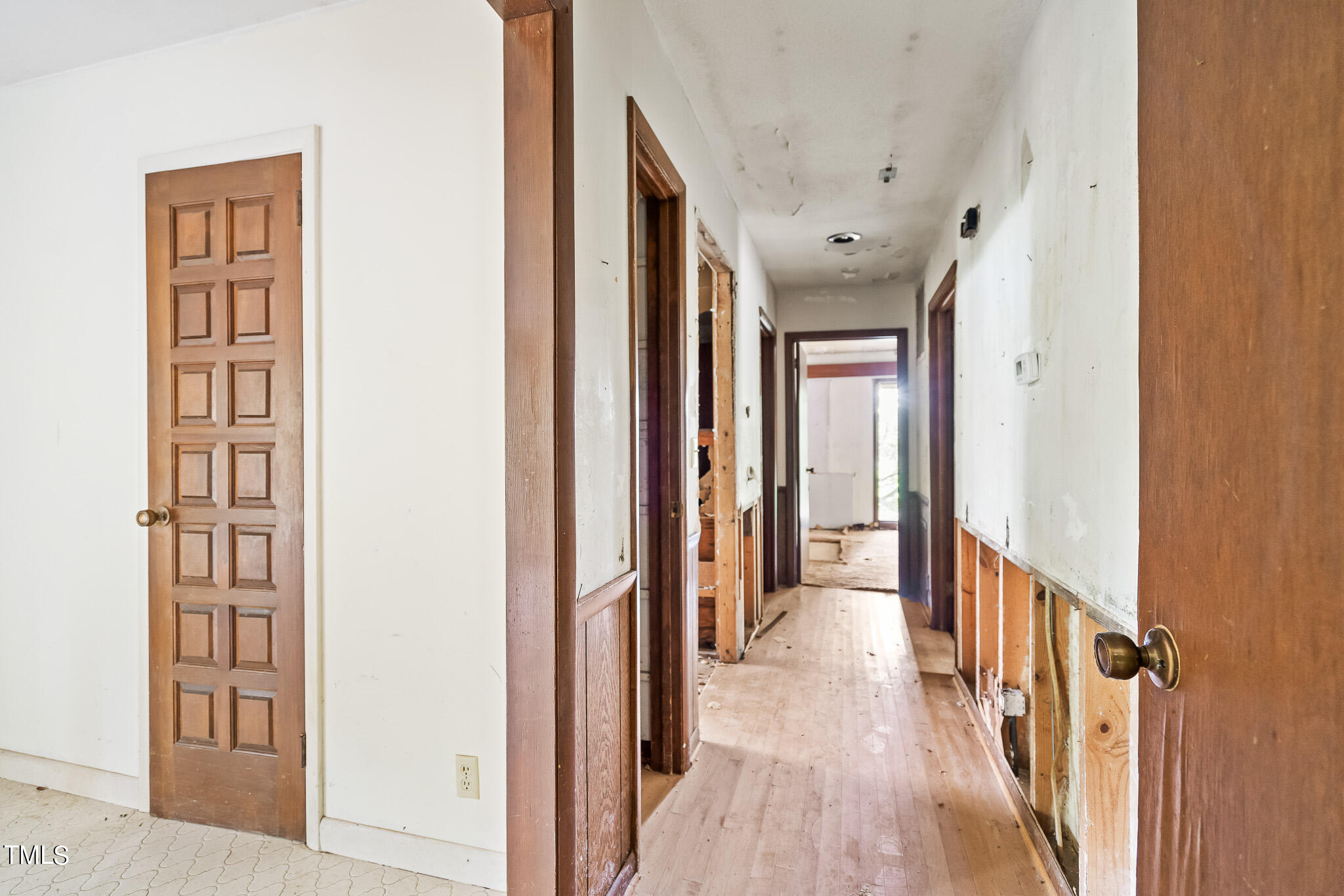 1875 Wilson Road Bennett, NC 27208 - Photo 69 of 70 a view of a hallway with wooden floor and windows