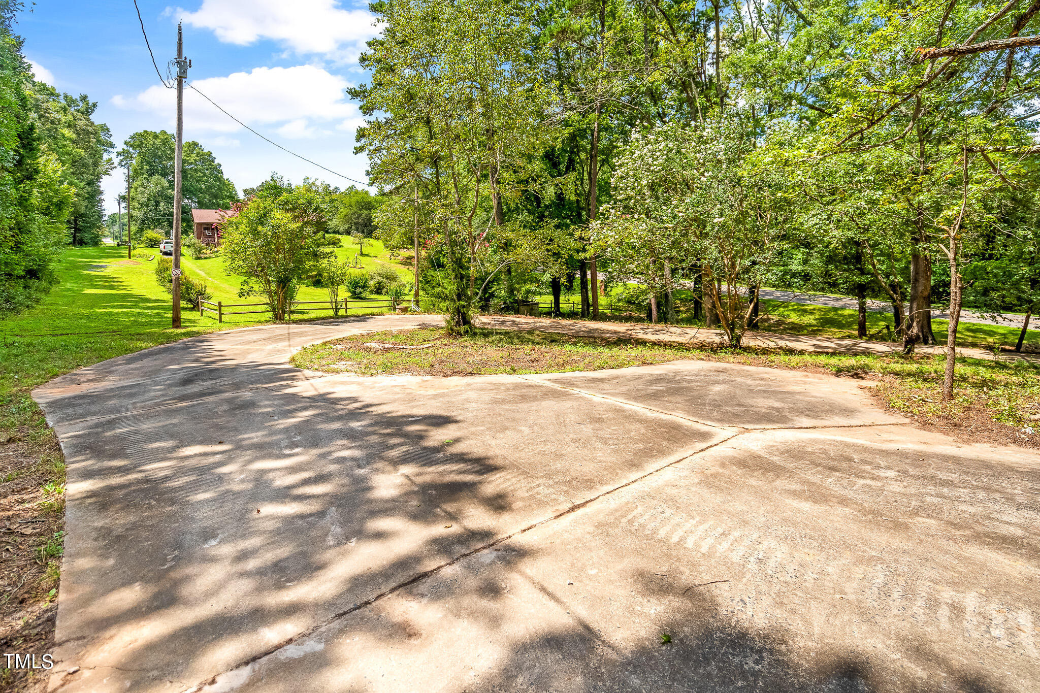 1875 Wilson Road Bennett, NC 27208 - Photo 8 of 70 a view of a yard with basketball court