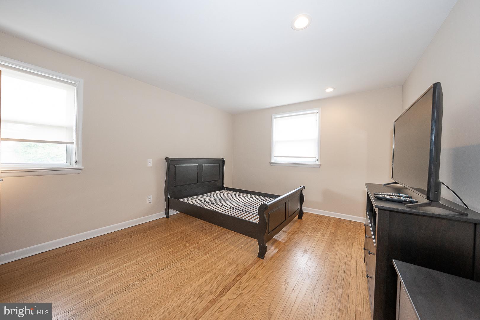 20 Fairview Road Swarthmore, PA 19081 - Photo 23 of 57 a living room with furniture and a flat screen tv
