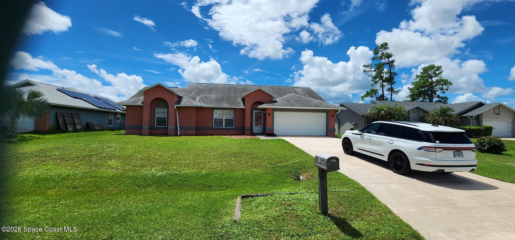 1660 Wake Forest Road Northwest Palm Bay, FL 32907 - Photo 1 of 29 Front