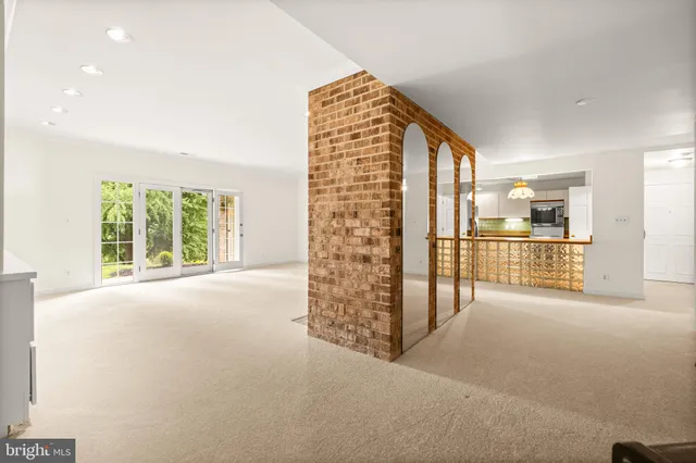 a view of livingroom with kitchen