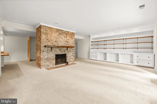 a view of a livingroom with a fireplace