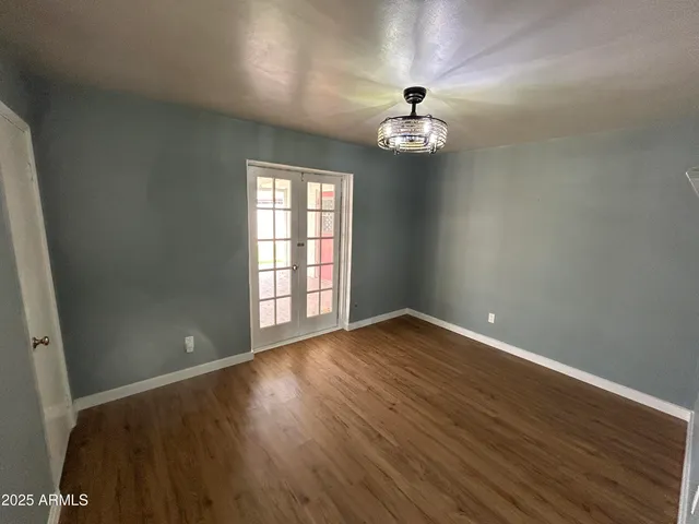 a bathroom with a toilet and a bathtub