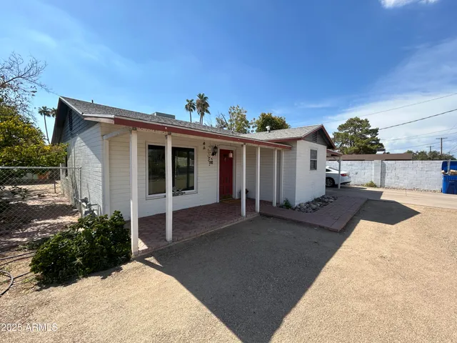 a front view of a house with a porch