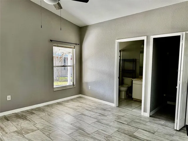 a view of a room with a wardrobe space