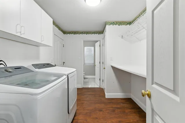 a kitchen with a sink and refrigerator