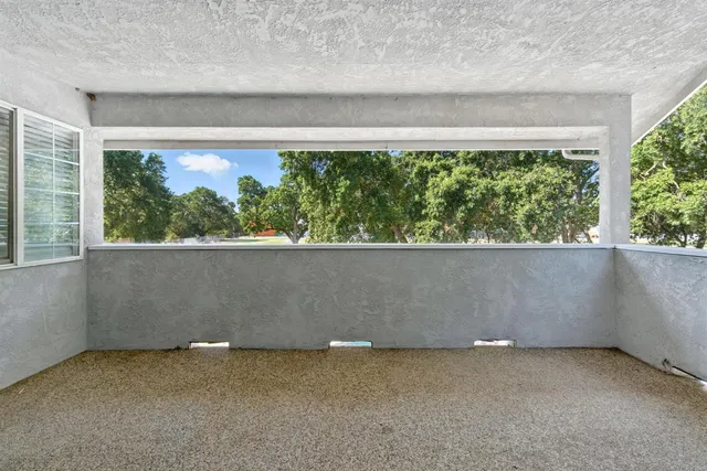 a view of a yard with an outdoor space