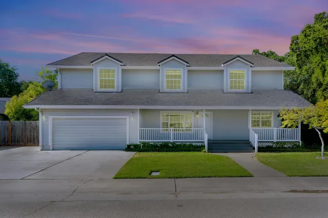 a view of swimming pool with a yard