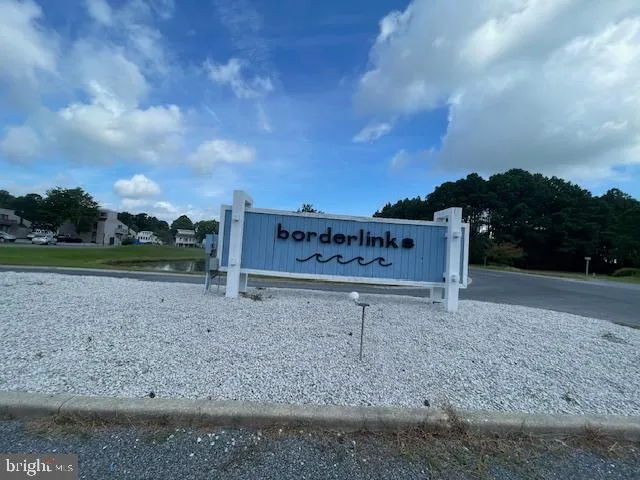 a view of outdoor space with playground and green space