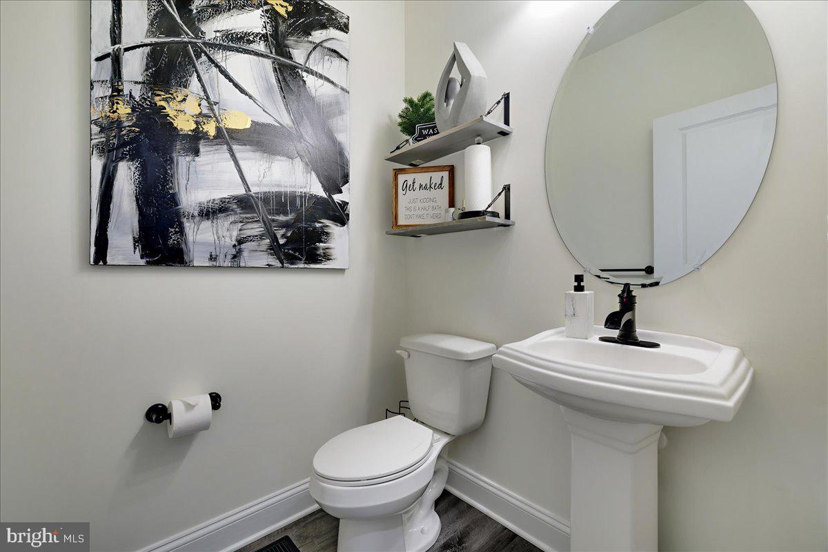 21 Greensborough Road Reisterstown, MD 21136 - Photo 20 of 54 a bathroom with a sink toilet and mirror