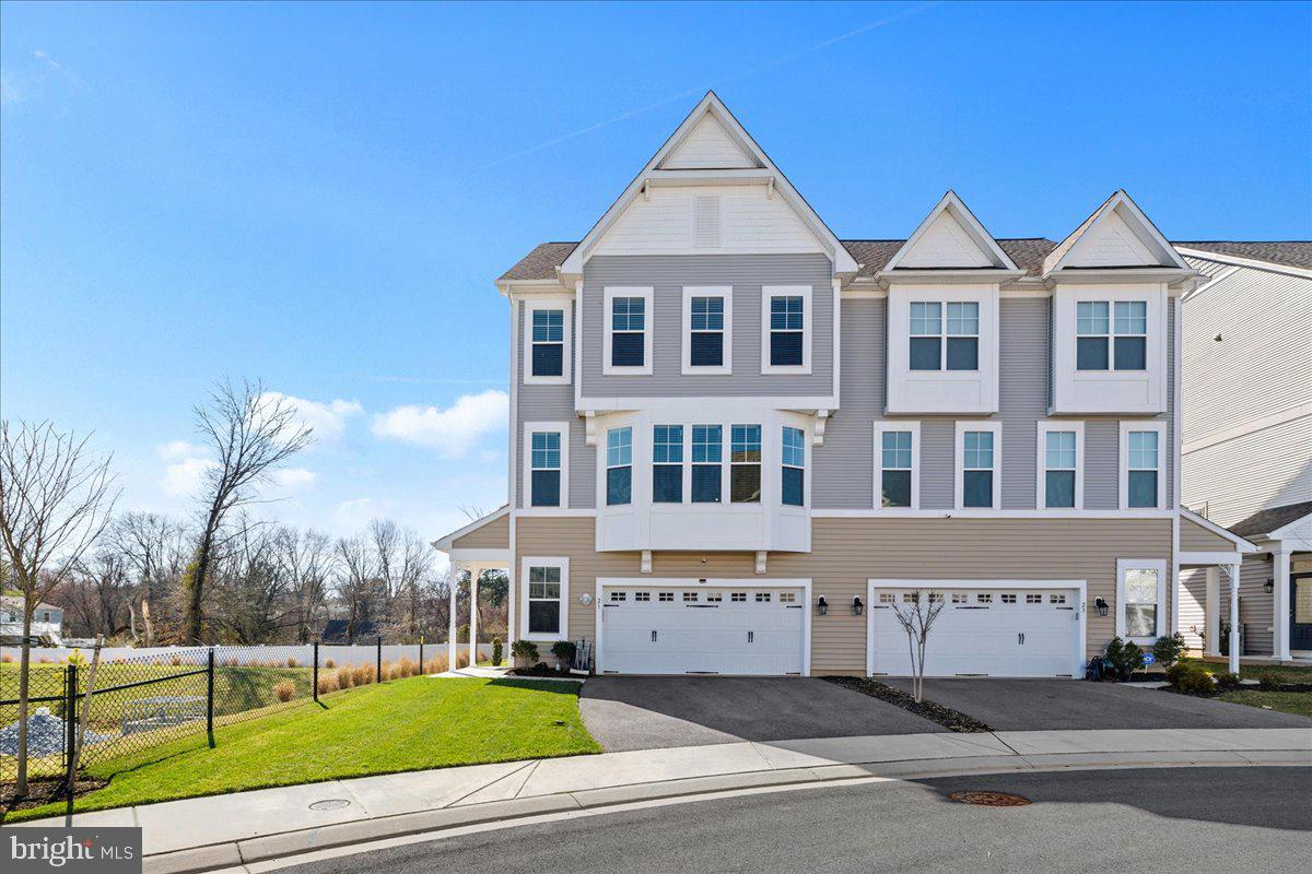 21 Greensborough Road Reisterstown, MD 21136 - Photo 2 of 54 a view of a big house with a big yard and potted plants