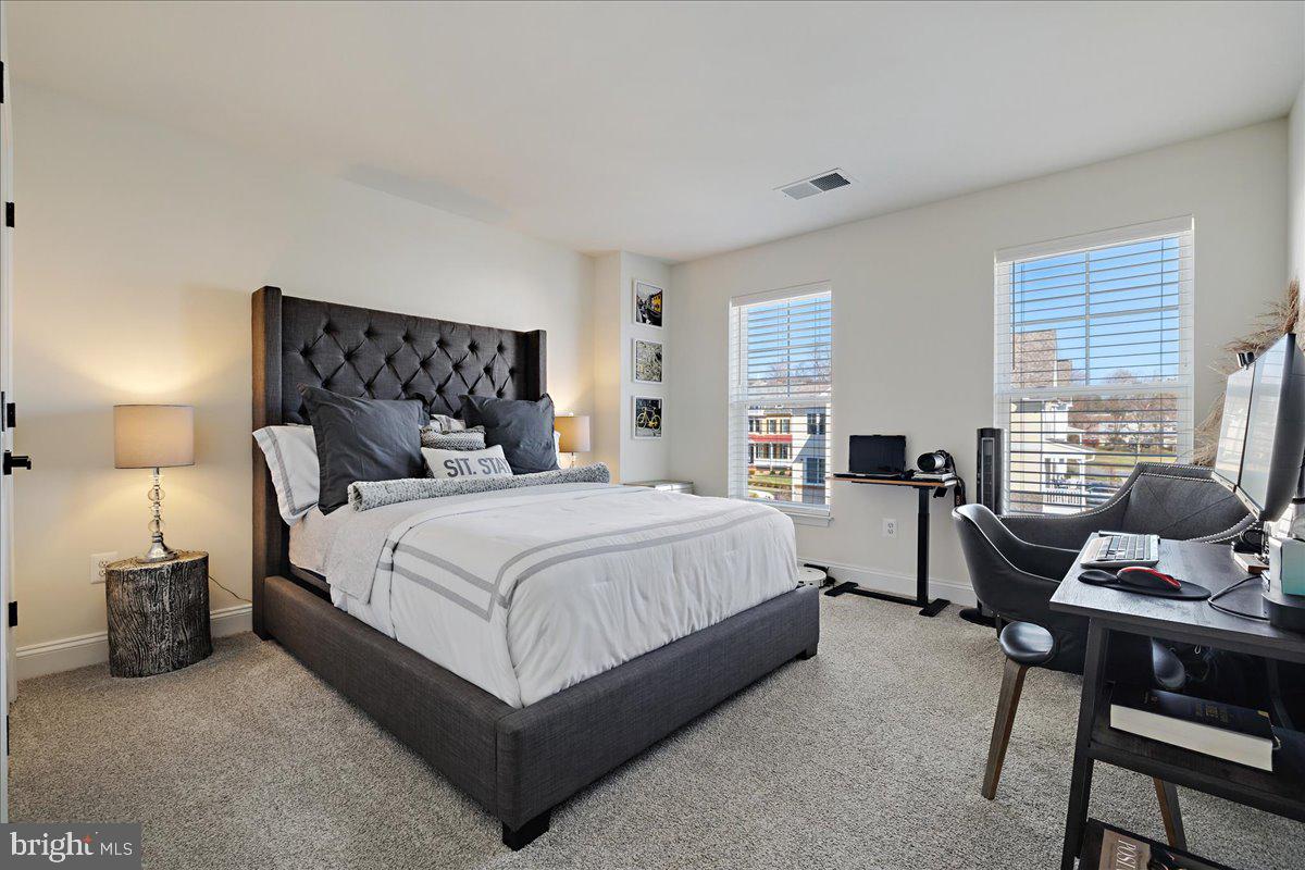 21 Greensborough Road Reisterstown, MD 21136 - Photo 21 of 54 a bedroom with a bed and a couch