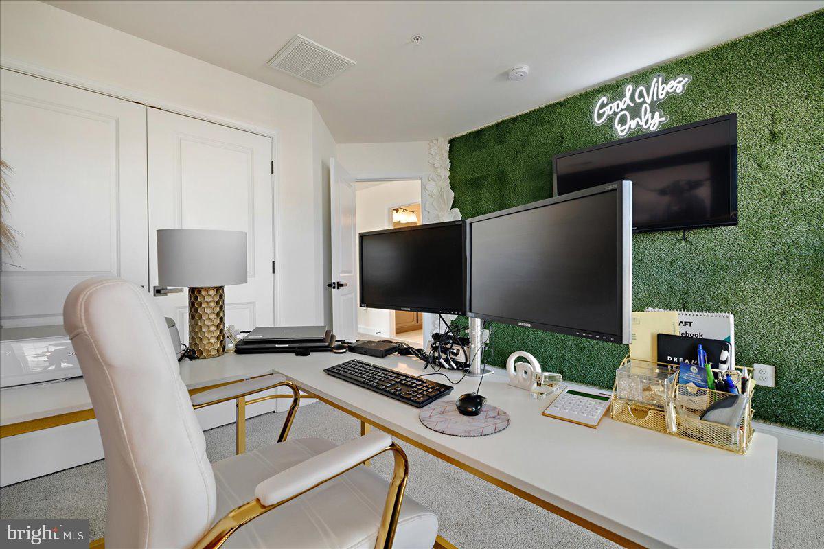 21 Greensborough Road Reisterstown, MD 21136 - Photo 24 of 54 a work room with furniture and a flat screen tv