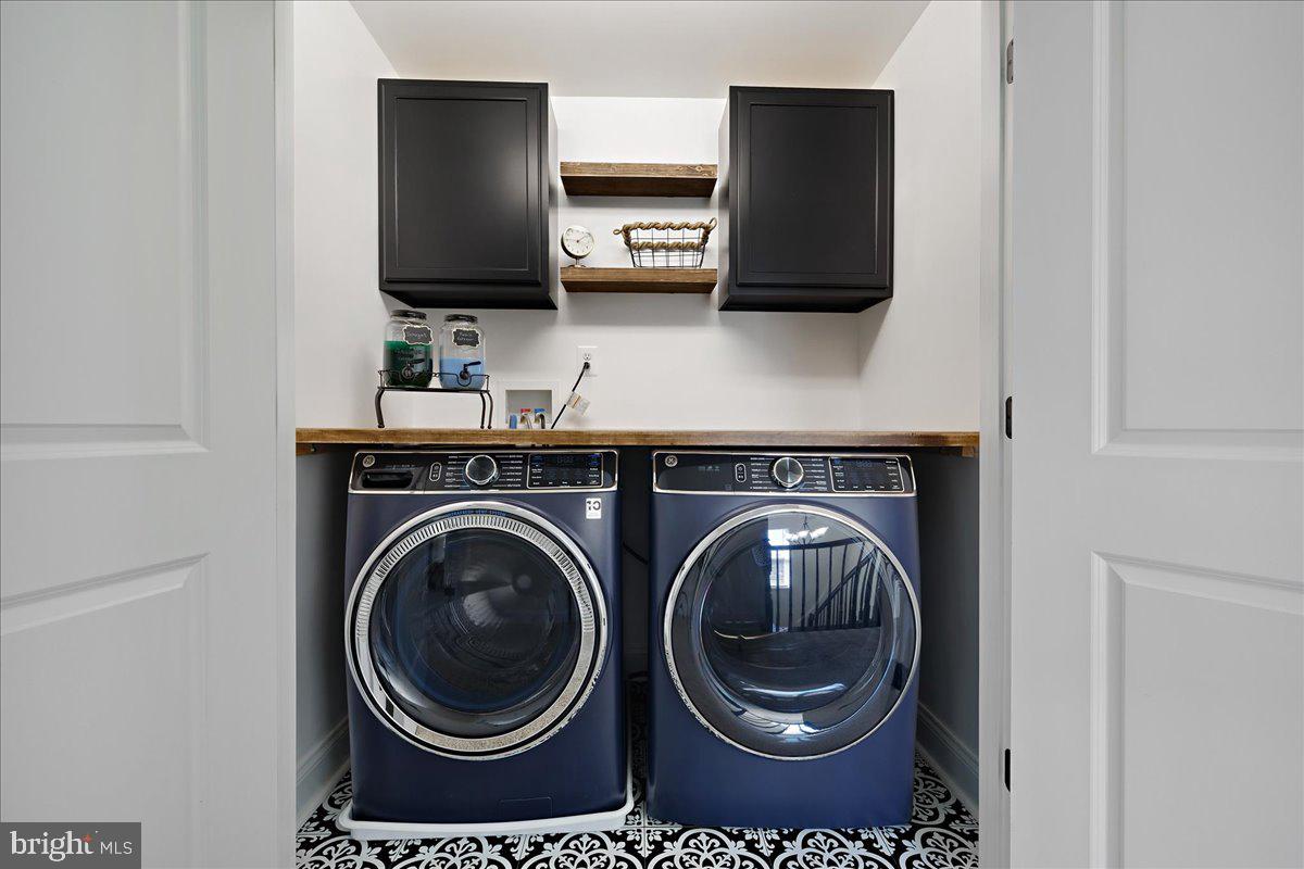21 Greensborough Road Reisterstown, MD 21136 - Photo 26 of 54 a view of washer and dryer in a utility room