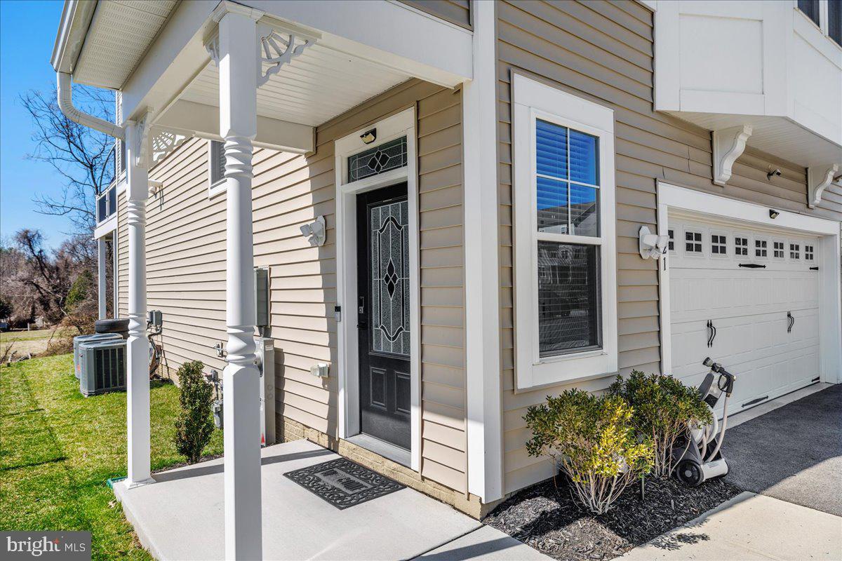21 Greensborough Road Reisterstown, MD 21136 - Photo 3 of 54 a view of a potted plants in front of a house