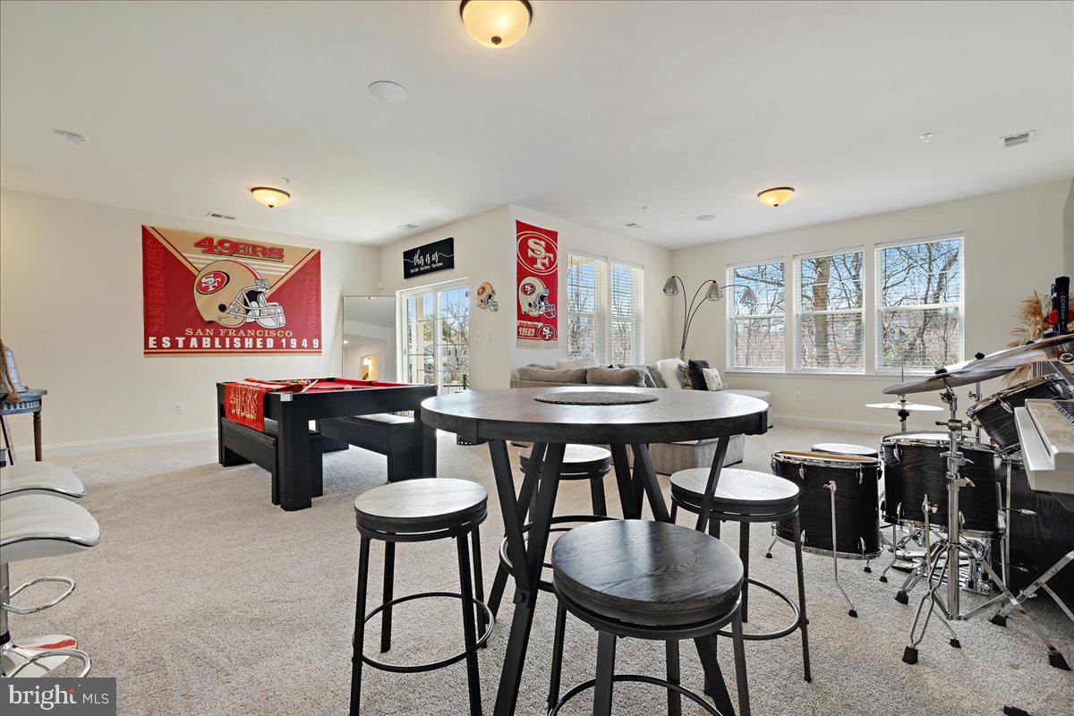 21 Greensborough Road Reisterstown, MD 21136 - Photo 38 of 54 a view of a dining room with furniture and wooden floor