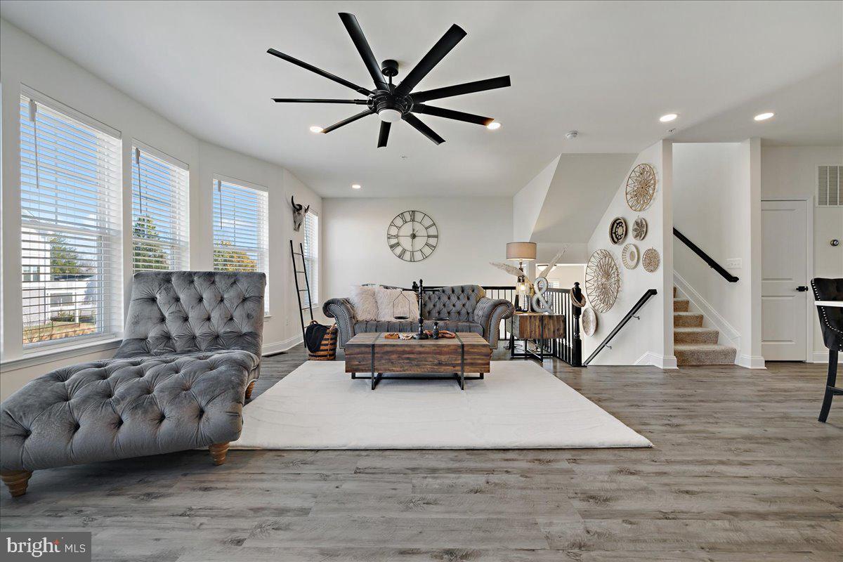 21 Greensborough Road Reisterstown, MD 21136 - Photo 6 of 54 a living room with furniture and a large window