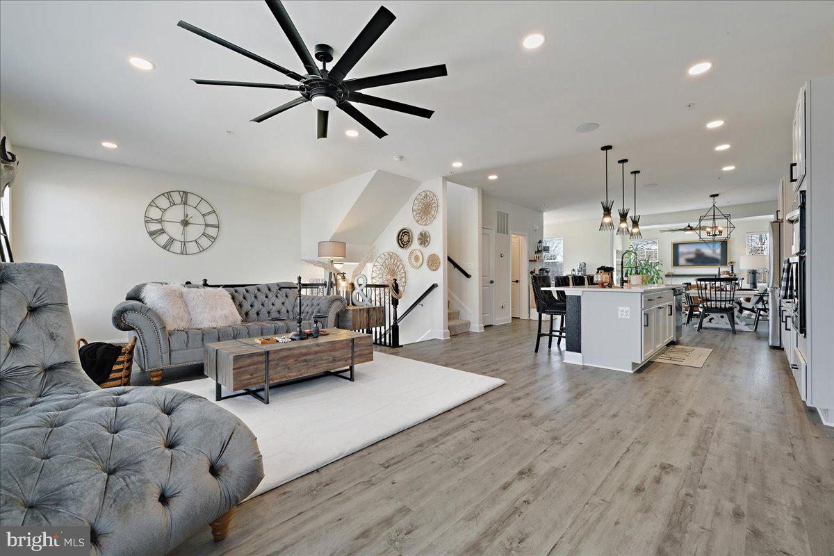 21 Greensborough Road Reisterstown, MD 21136 - Photo 7 of 54 a living room with furniture and kitchen view