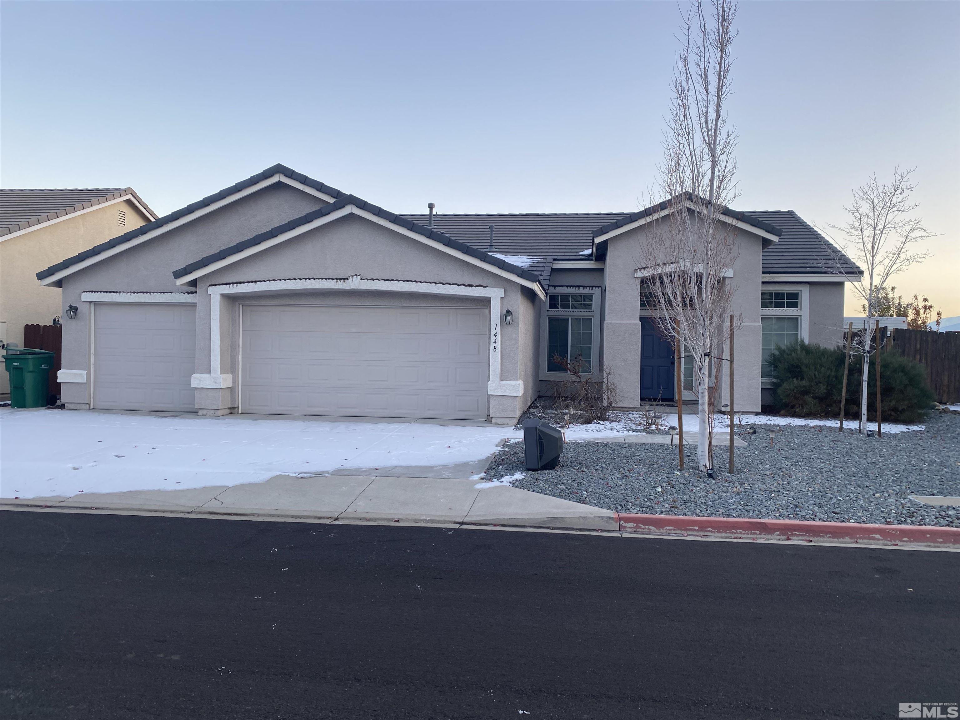 1448 Hagar Road Reno, NV 89506 - Photo 1 of 1 a front view of a house with yard