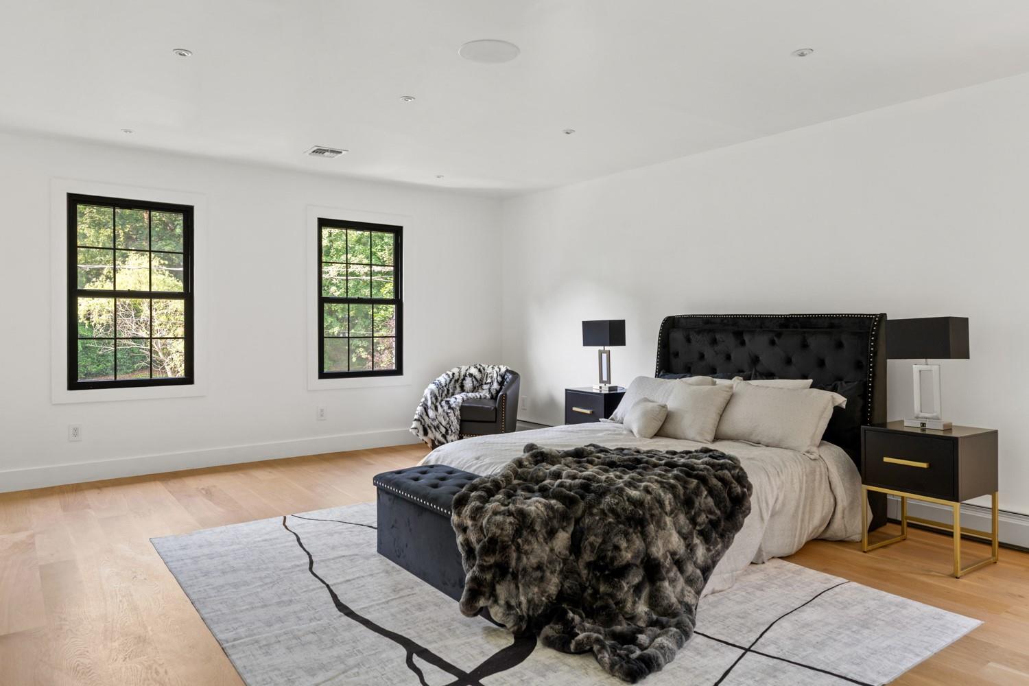 33 High Farms Road Glen Head, NY 11545 - Photo 19 of 35 Bedroom with light wood-style flooring and baseboards