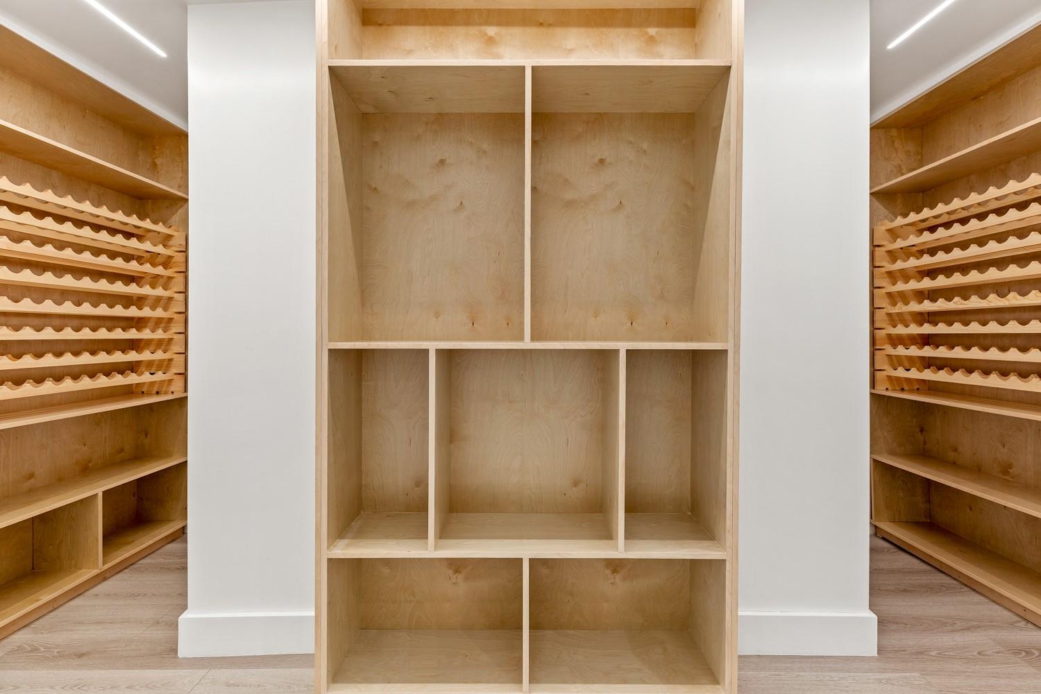 33 High Farms Road Glen Head, NY 11545 - Photo 30 of 35 Wine room featuring wood finished floors and baseboards