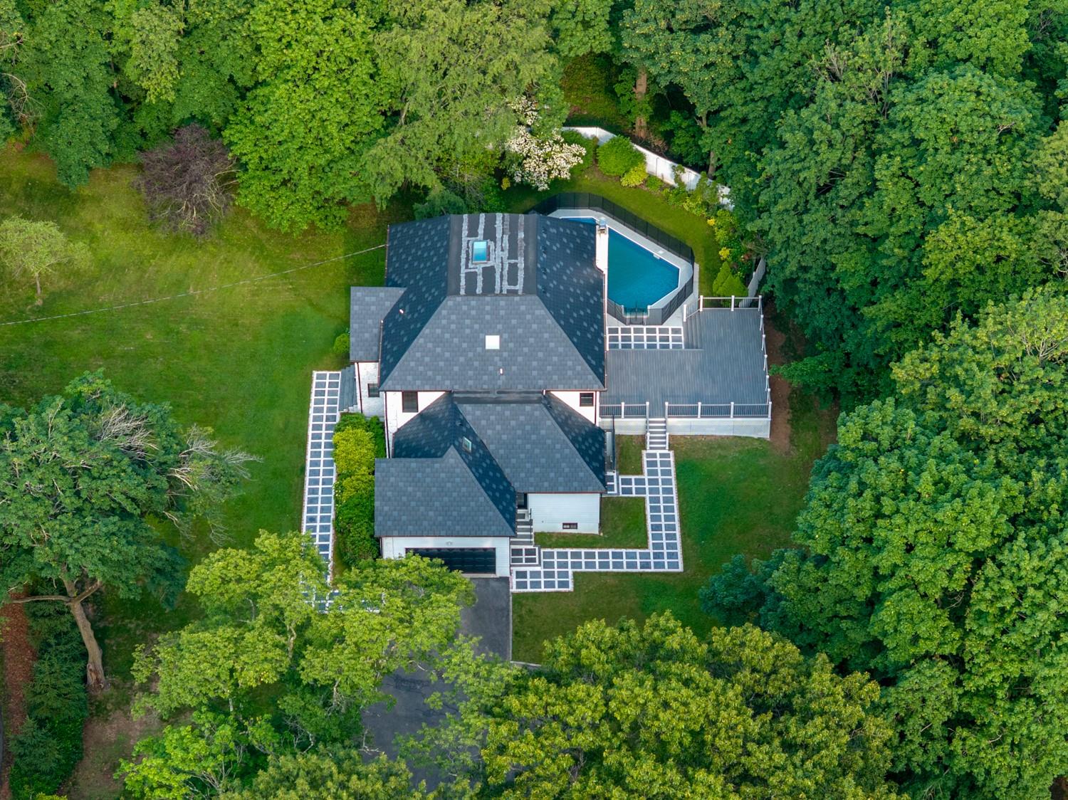 33 High Farms Road Glen Head, NY 11545 - Photo 5 of 35 View from above of property featuring a heavily wooded area