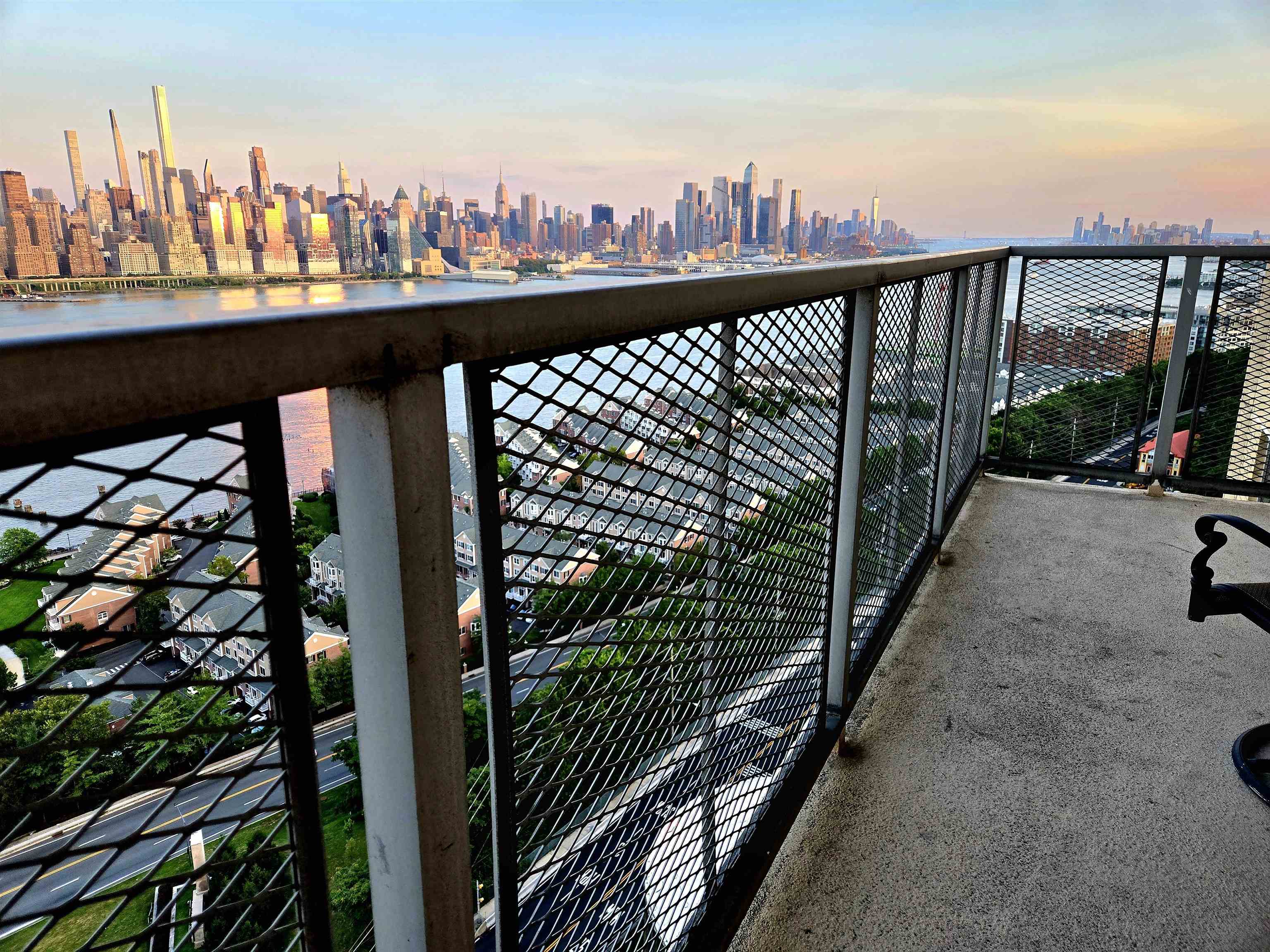 6600 Boulevard East, Unit 15D West New York, NJ 07093 - Photo 2 of 29 a view of a balcony with city view