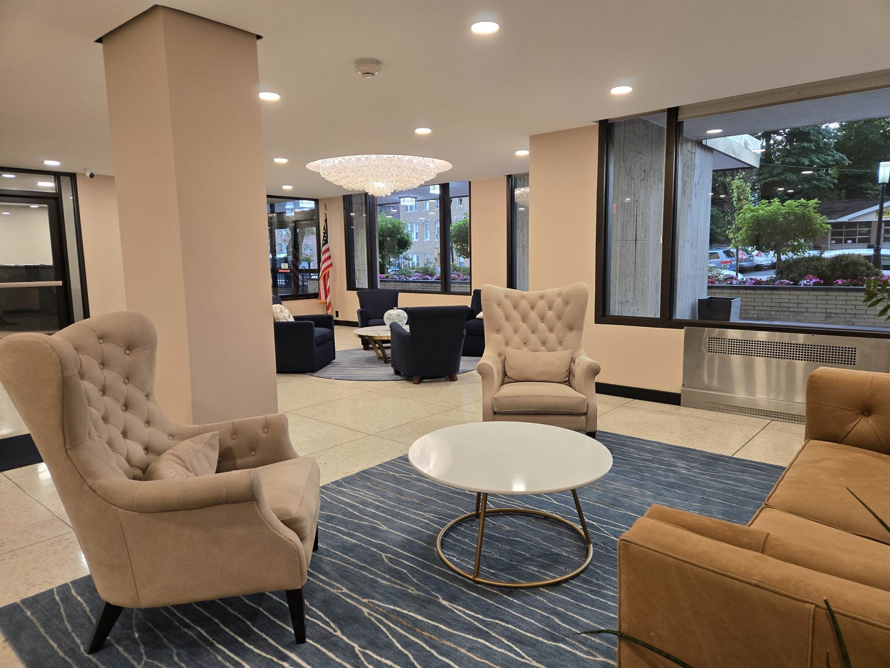 6600 Boulevard East, Unit 15D West New York, NJ 07093 - Photo 22 of 29 a living room with furniture and a large window