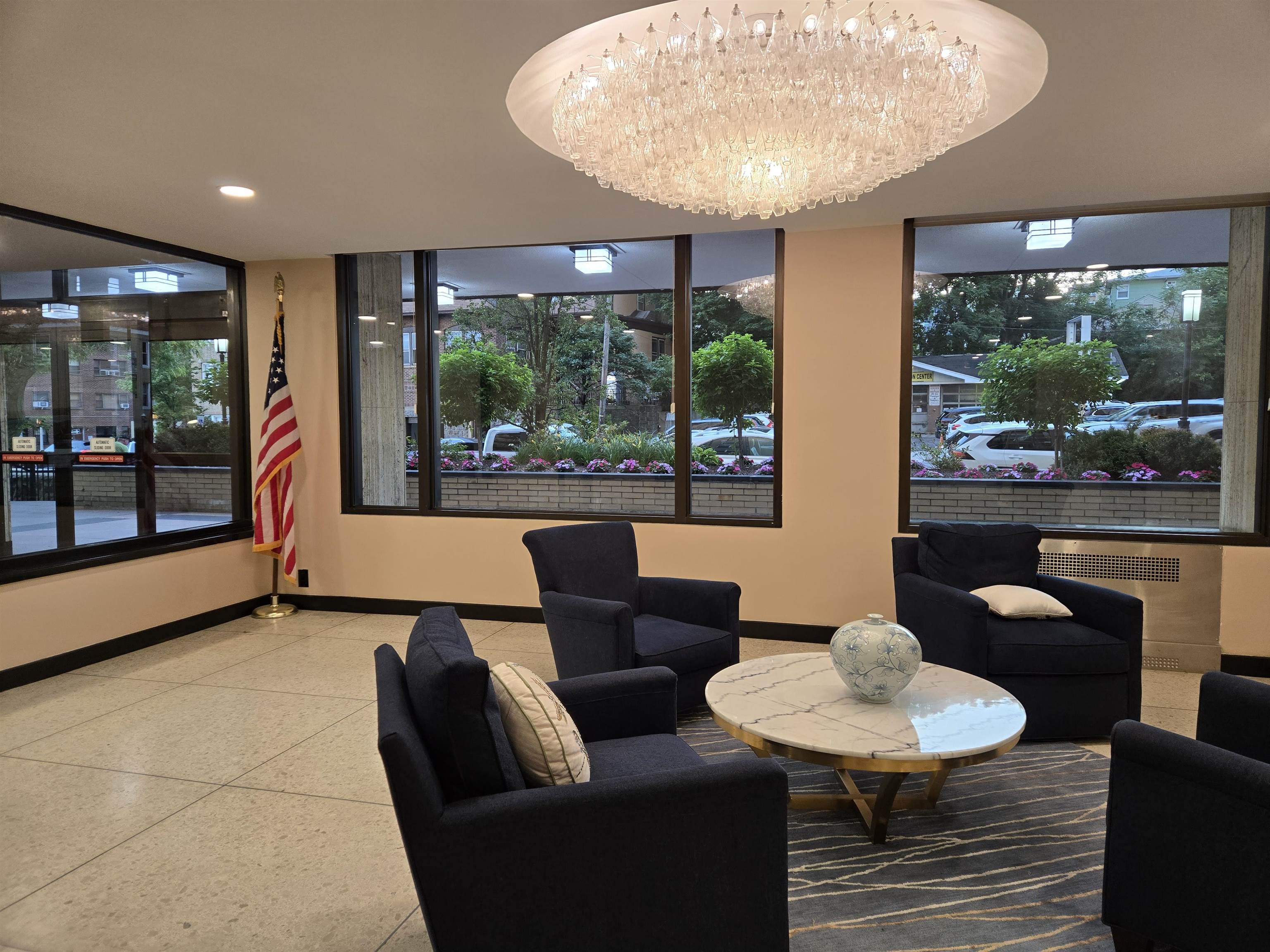 6600 Boulevard East, Unit 15D West New York, NJ 07093 - Photo 25 of 29 a living room with furniture and a large window