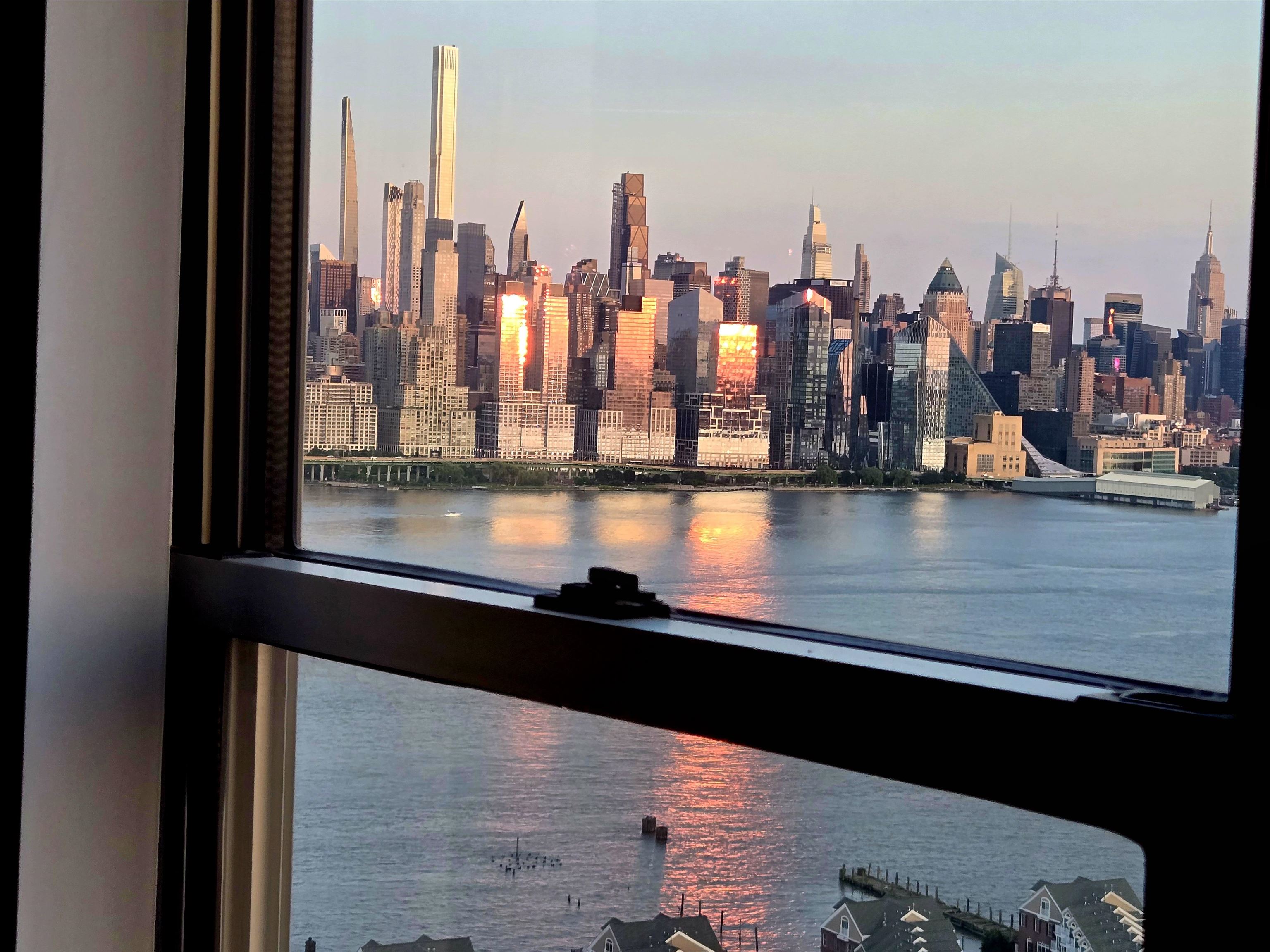 6600 Boulevard East, Unit 15D West New York, NJ 07093 - Photo 4 of 29 a view of a lake from a balcony