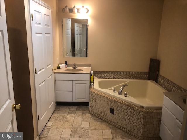 159 Juniata Parkway East Newport, PA 17074 - Photo 12 of 37 a spacious bathroom with a tub sink and mirror