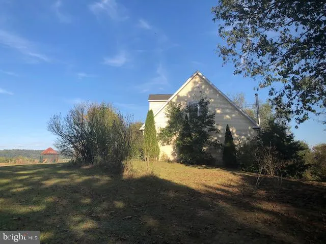 a view of outdoor space and yard
