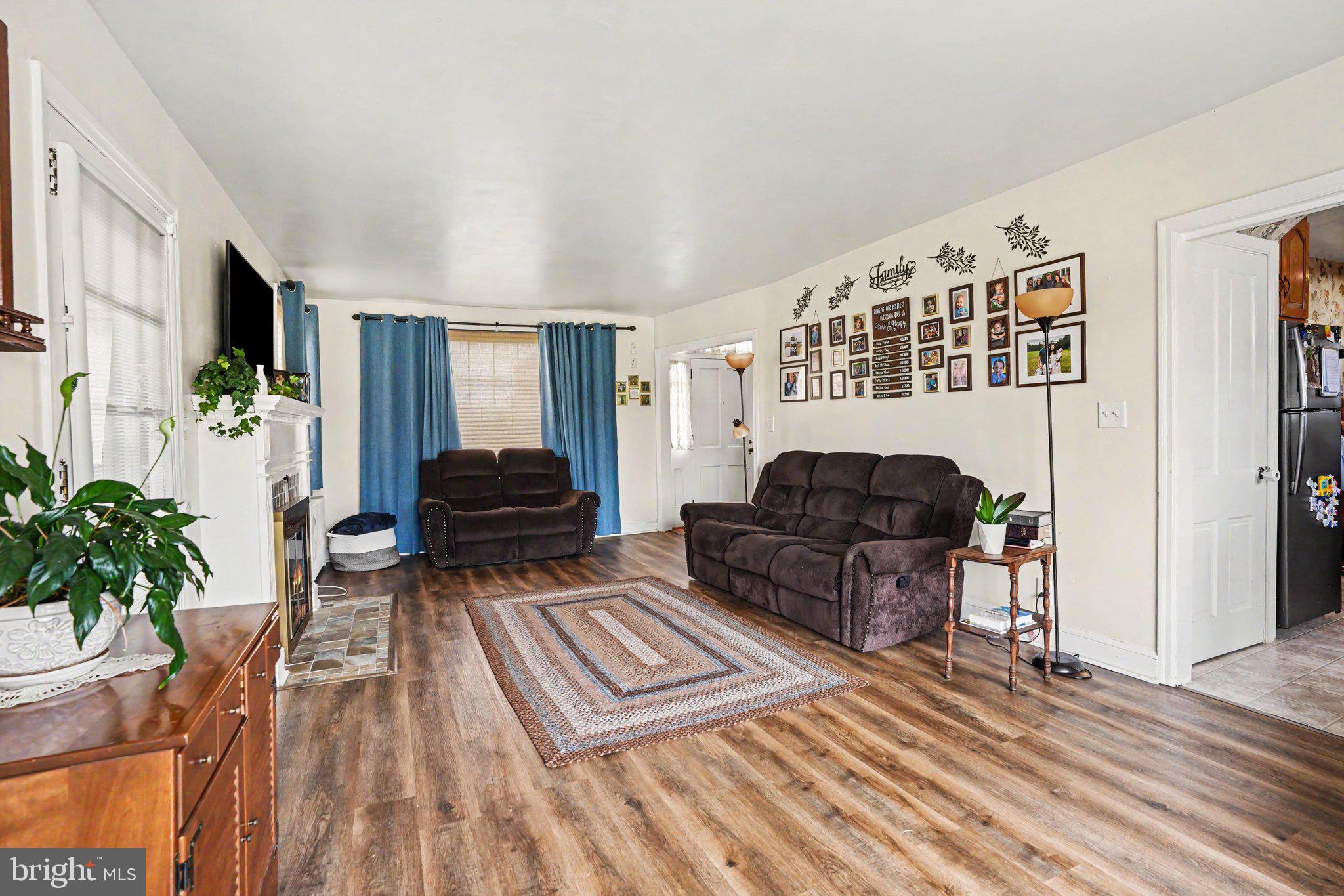 420 Carlisle Road Biglerville, PA 17307 - Photo 14 of 41 a living room with furniture and a fireplace