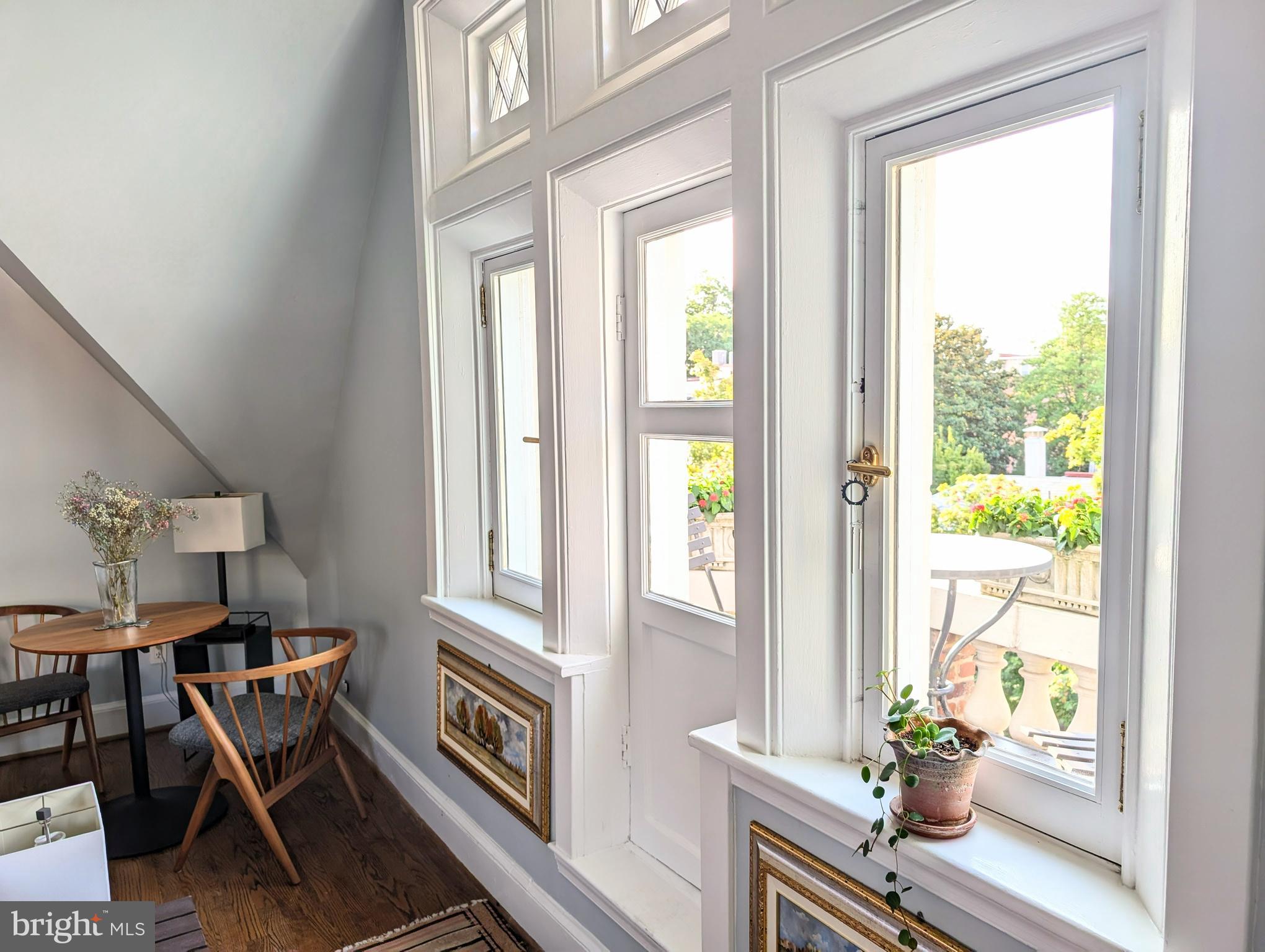2001 19th Street Northwest, Unit 10 Washington, DC 20009 - Photo 13 of 38 a living room with furniture and a window