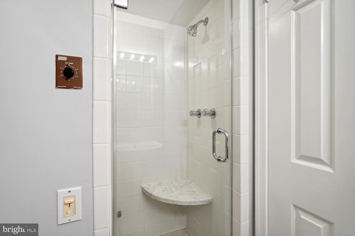 2001 19th Street Northwest, Unit 10 Washington, DC 20009 - Photo 27 of 38 a bathroom with a shower