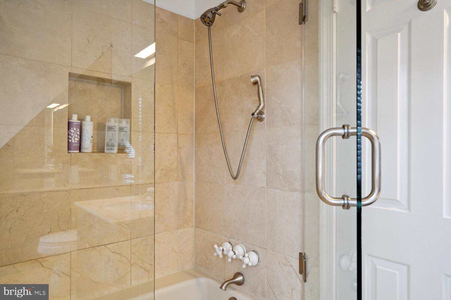 2001 19th Street Northwest, Unit 10 Washington, DC 20009 - Photo 33 of 38 a bathroom with a shower