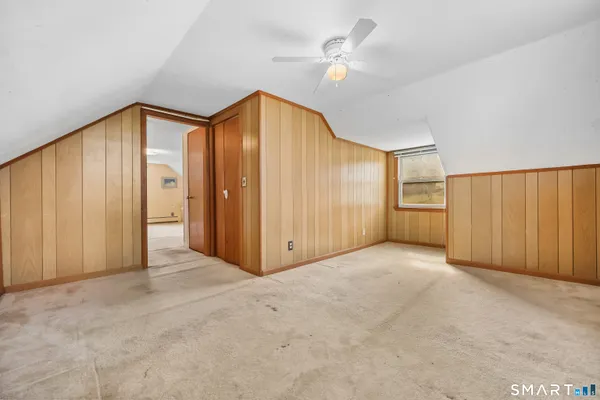 a view of a livingroom with bathroom
