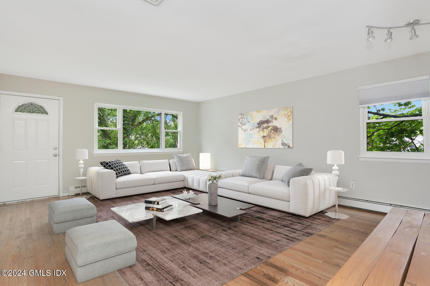 5 Green Lane, Unit A Greenwich, CT 06831 - Photo 4 of 24 a living room with furniture and a large window