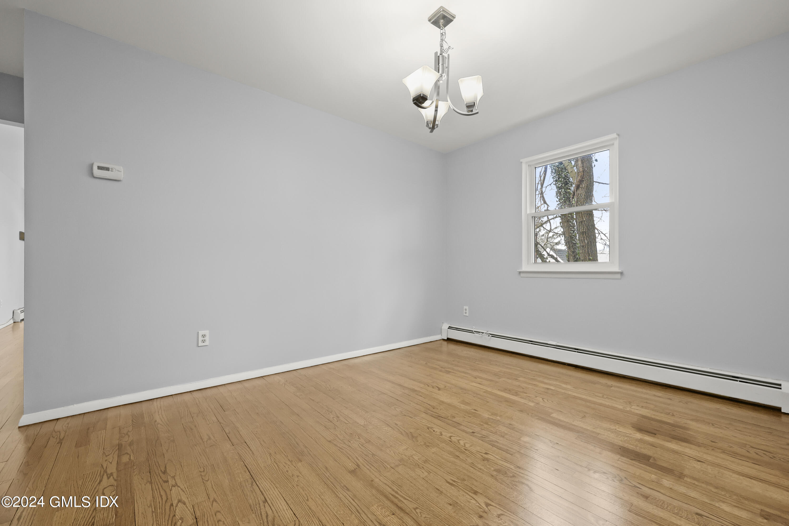 5 Green Lane, Unit A Greenwich, CT 06831 - Photo 10 of 24 a view of an empty room with a window