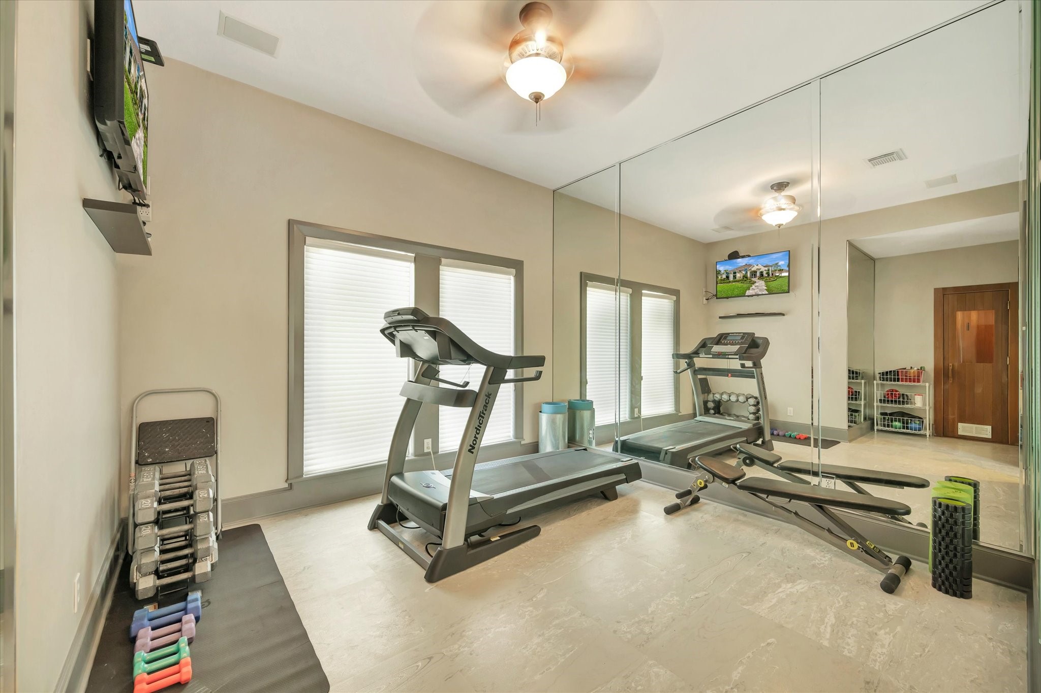 14214 Golf View Trail Houston, TX 77059 - Photo 31 of 49 a view of a room with gym equipment