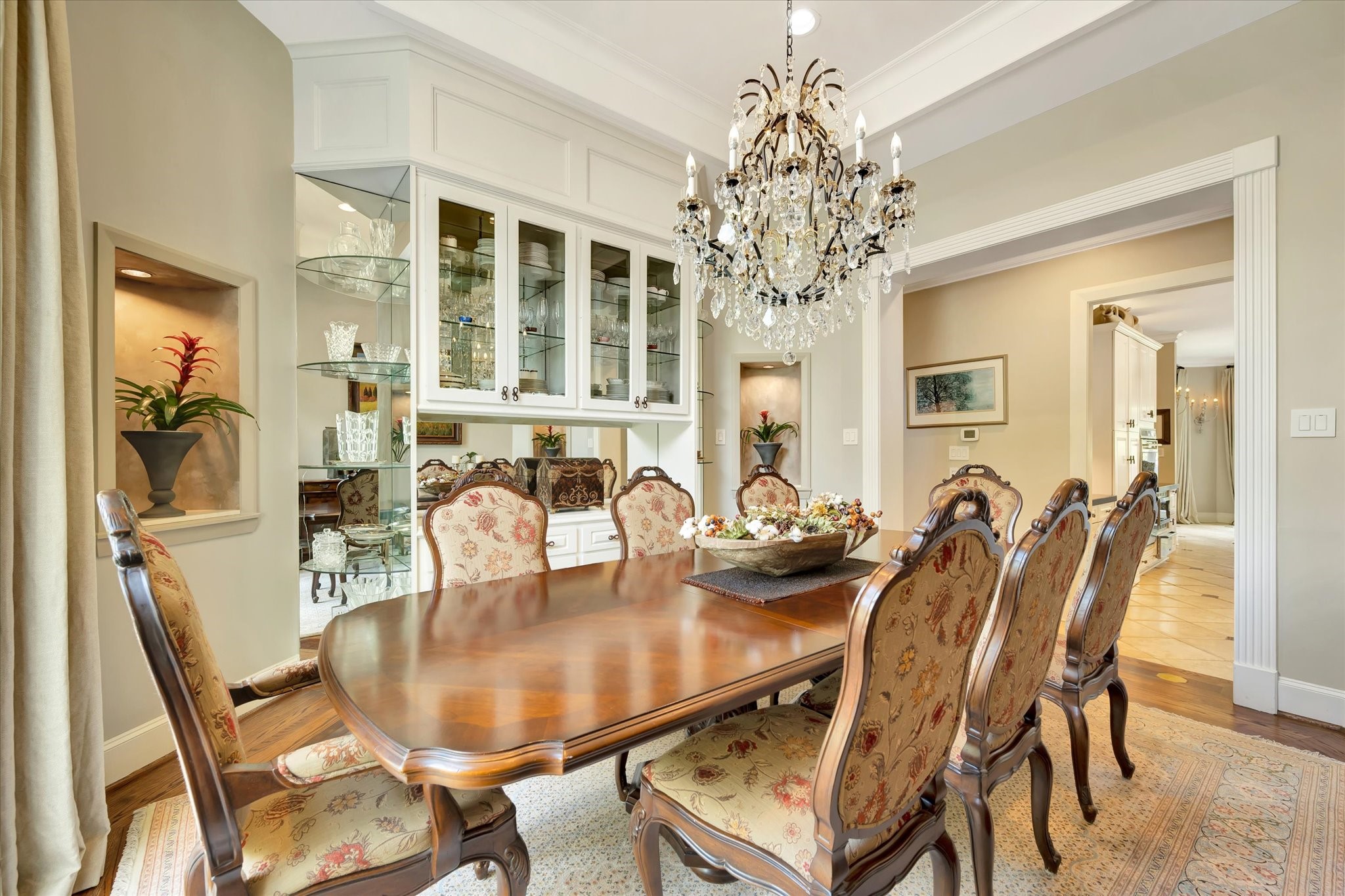 14214 Golf View Trail Houston, TX 77059 - Photo 34 of 49 a dining room with furniture a chandelier and wooden floor