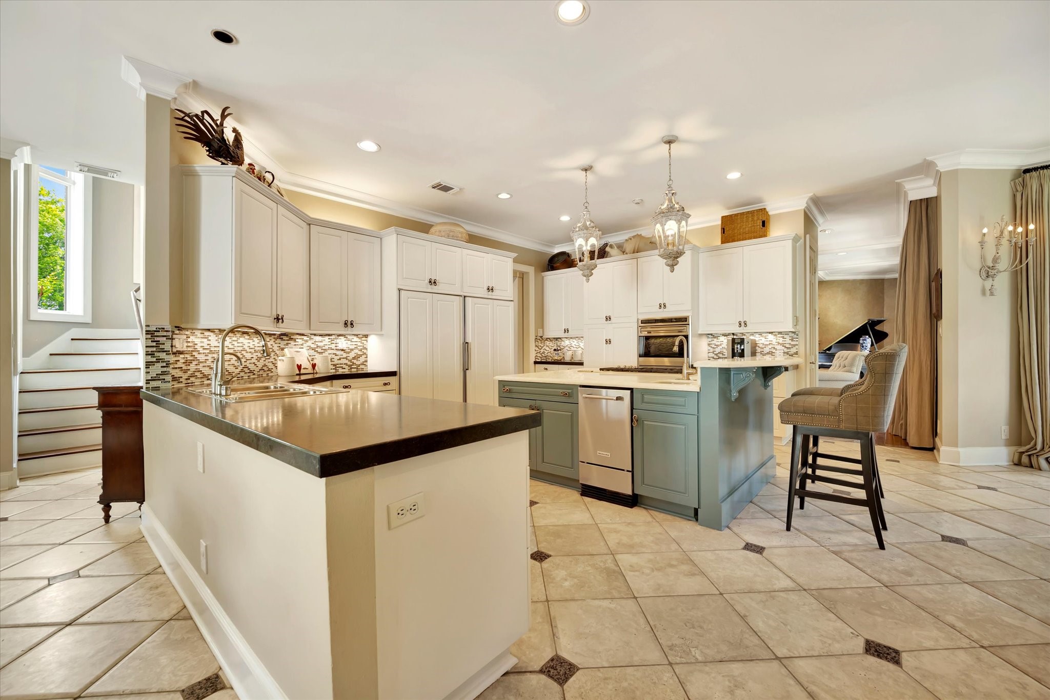 14214 Golf View Trail Houston, TX 77059 - Photo 38 of 49 a kitchen with a sink a counter top space cabinets and stainless steel appliances
